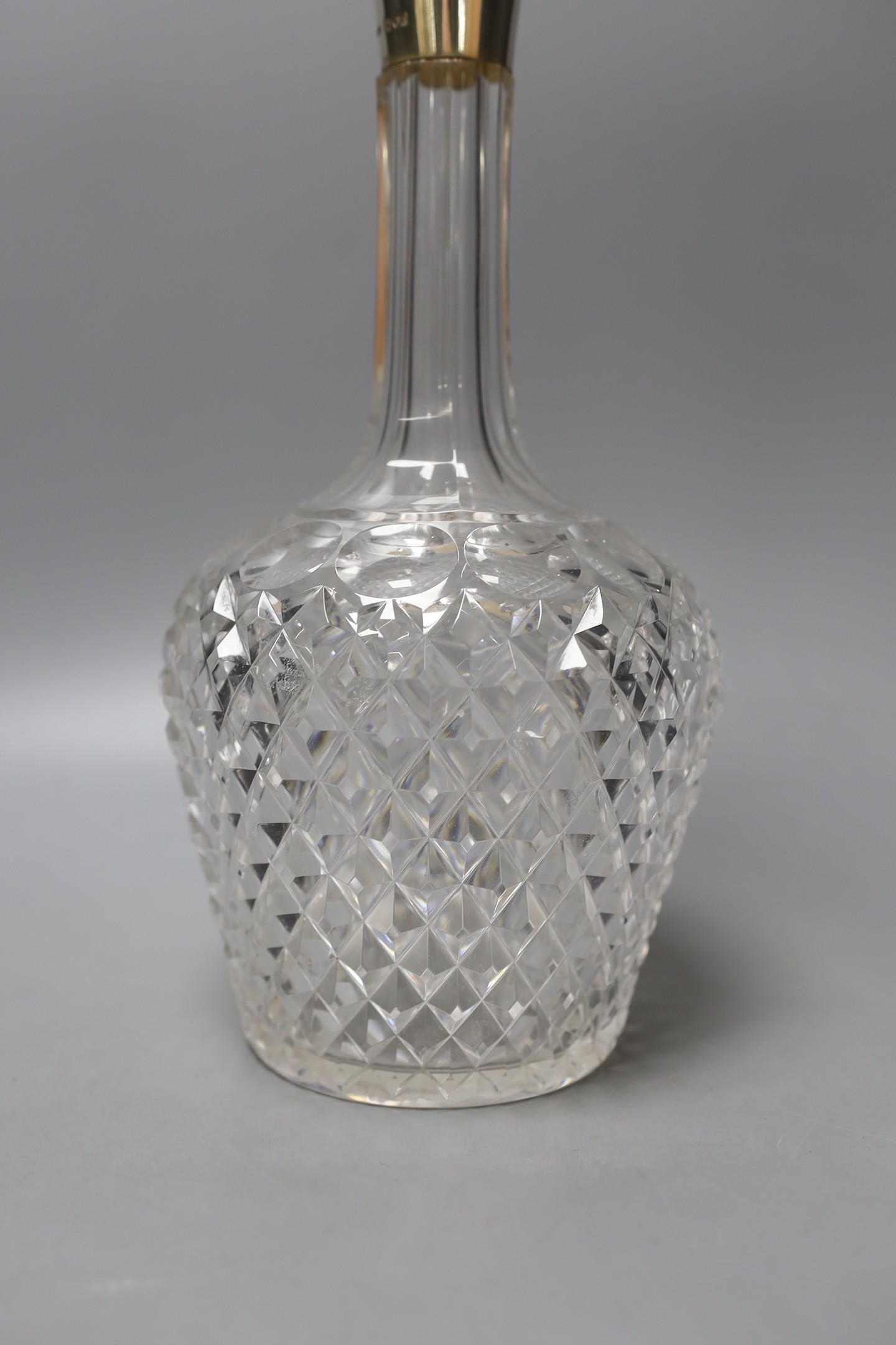 A late Victorian silver mounted cut glass decanter and stopper, John Grinsell & Sons, London, 1900, 35.5cm.